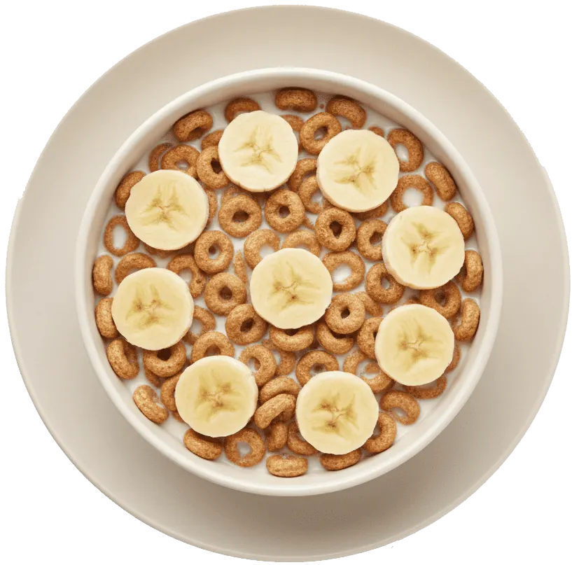 Cereal with milk and banana slices